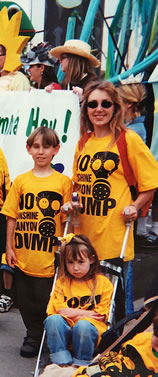 family protesting wearing no sunshine canyon dump t-shirt